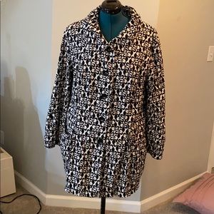 Black and white blazer.